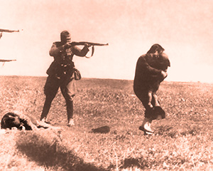 A defenceless young Jewish mother from Kiev vainly attempts to shield her young child from the bullets of the Nazi Einsatzgruppen executioners at the Jewish massacre at Ivangorod in Ukraine, 1942.